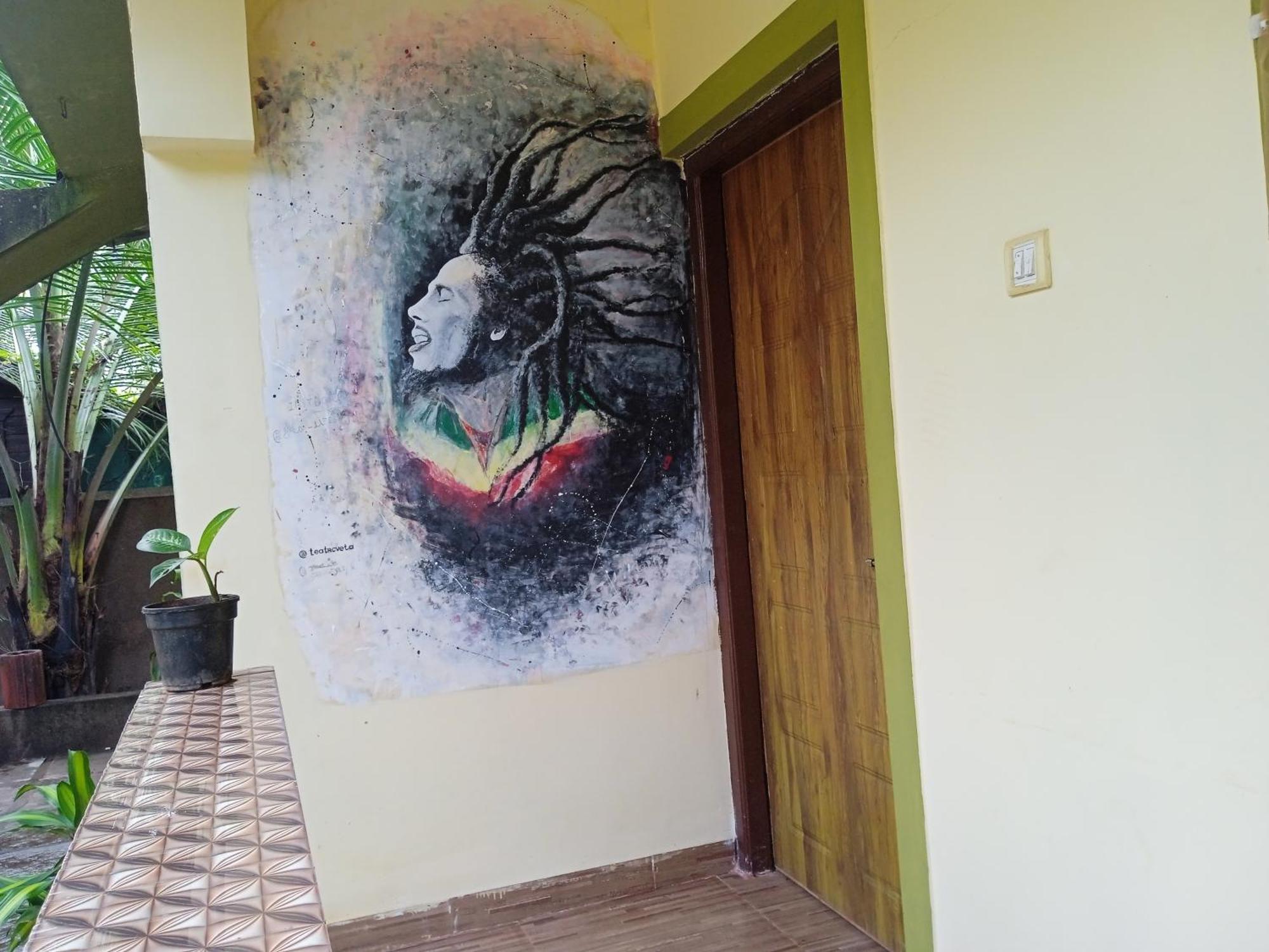 One Love Guest House Morjim Buitenkant foto
