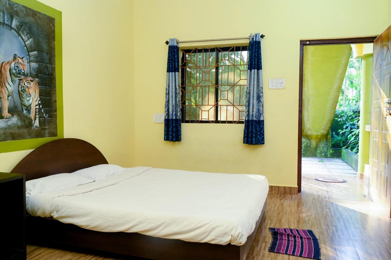 One Love Guest House Morjim Buitenkant foto