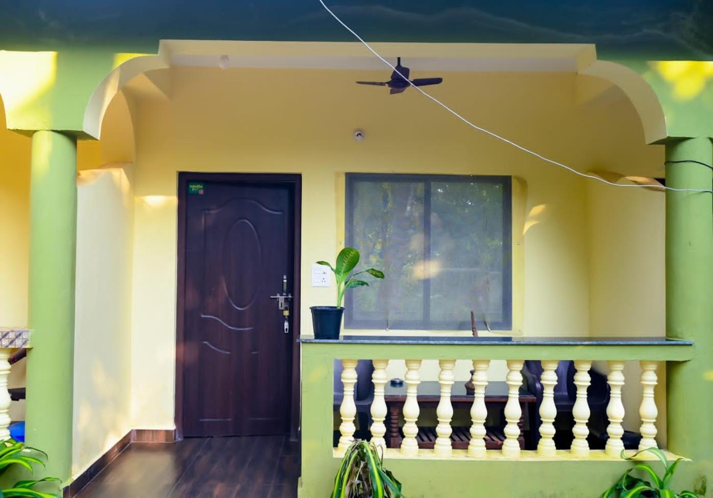 One Love Guest House Morjim Buitenkant foto