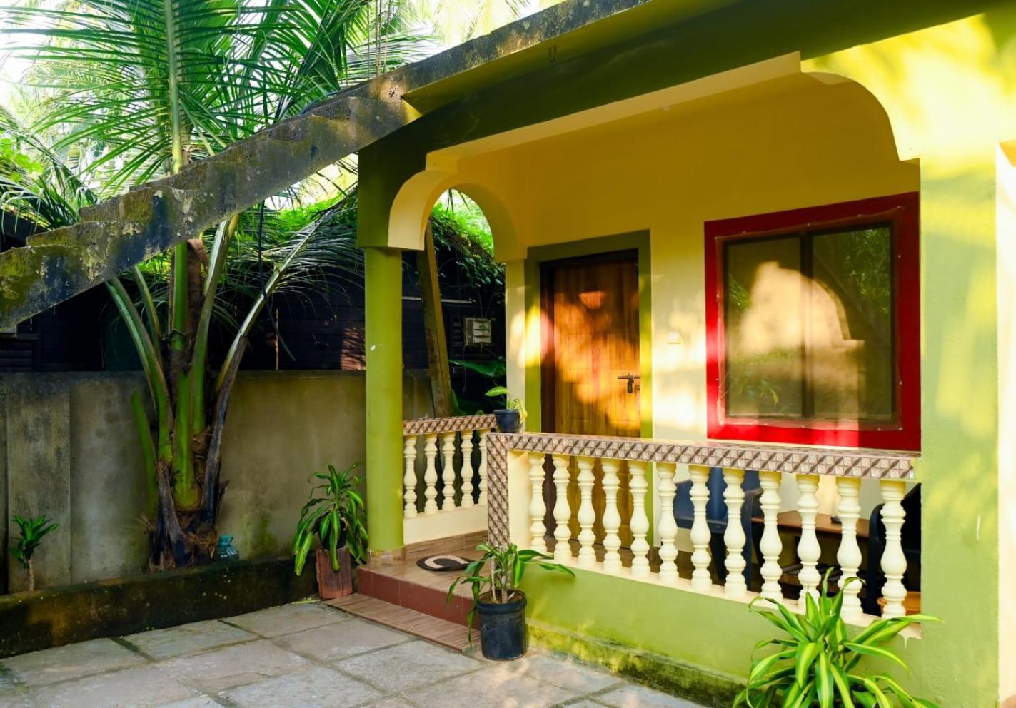 One Love Guest House Morjim Buitenkant foto